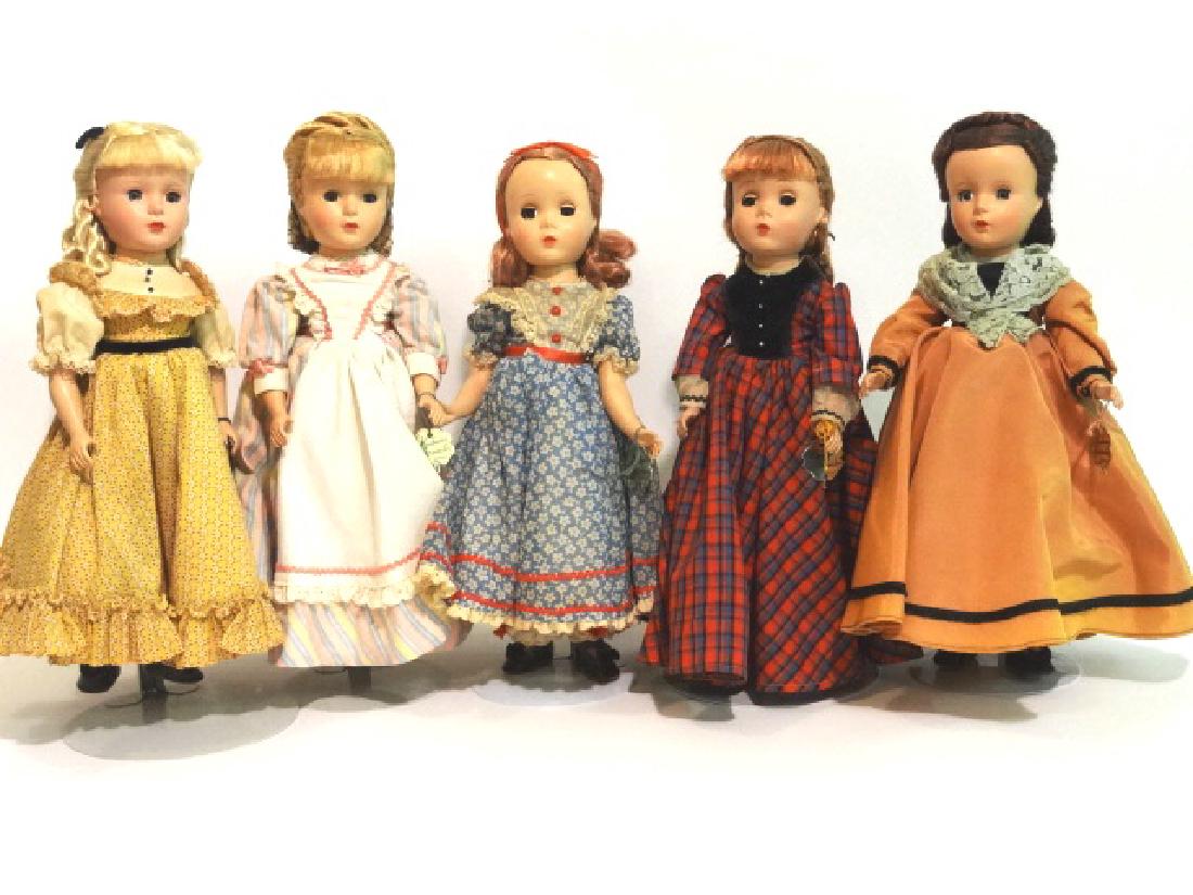 Madame Alexander Little Women Dolls: Five 14 in. Madame Alexander Little Women dolls, 4 have tagged dress, names - Jo, Amy, Meg, Beth, doll in tan dress has Madame Alexander tag, all have wrist tags