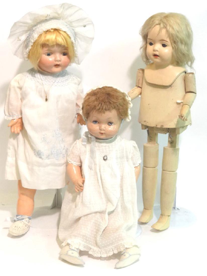 Three Composition Dolls: Effanbee sweetie pie, 23in. Composition head, arms and legs, cloth body with crier, flirty blue eyes, original mohair wig; 27in. Unmarked mama doll, composition shoulder head, arms, legs, replaced clo