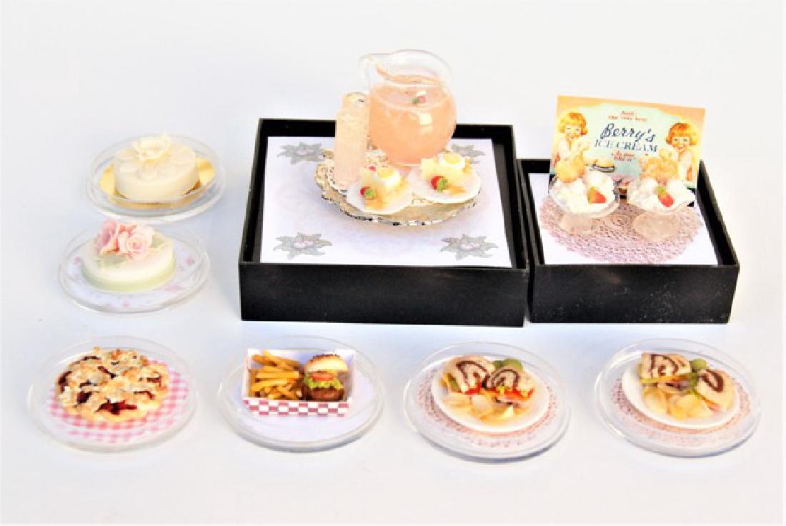 Betsy Niederer Miniature Desserts: Betsy Niederer dollhouse miniature food, two cakes, pie, burger with fries, two sandwiches with chips, two ice cream treats and a tray loaded with a pitcher of lemonade, glasses and pie