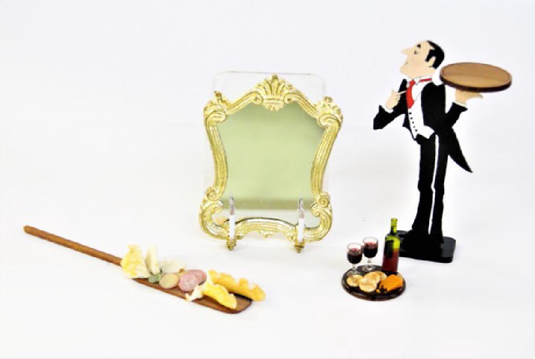 Mr. K. Lighted Dollhouse Mirror & Butler: Lumenations By Mr. K. electrified girandole rococo mirror with shell crest 2.75"H, 2.25"W, artisan butler holding tray 3 5/8"H, wood tray with wine bottle, glasses and snacks, baking board 4.5"L loade