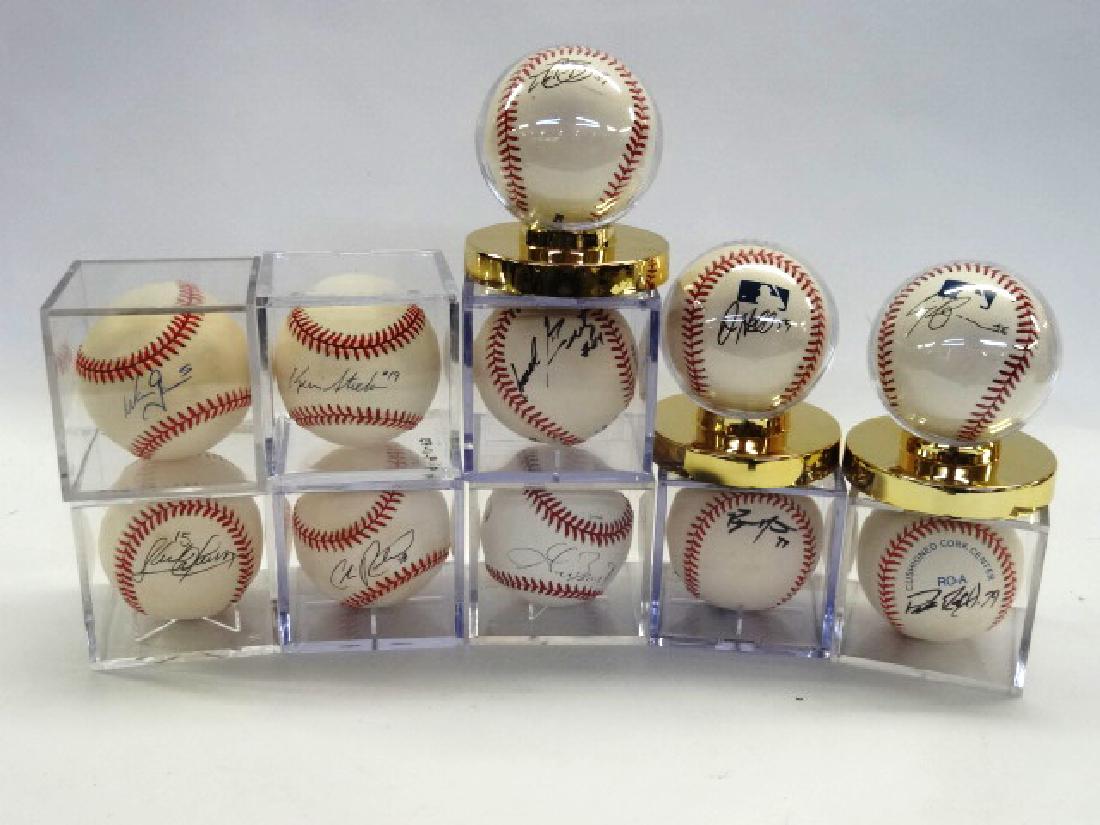 Eleven Autographed baseballs (1 of 1)