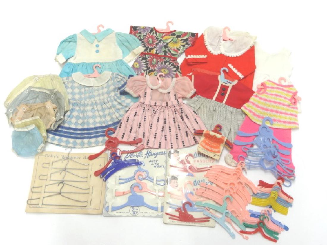 Grouping of Doll Dresses and Hangers (1 of 1)