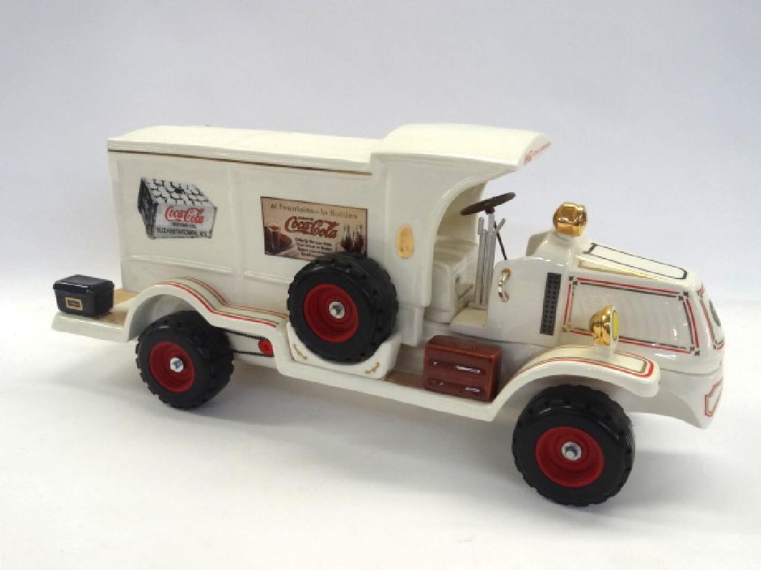 Pacesetter Mack Bulldog C-Cab Decanter With Coca-Cola: Handcrafted Pacesetter decanter with Coca-Cola advertising, C-Cab Mack Bulldog truck, red rims, gold trims with luggage racks