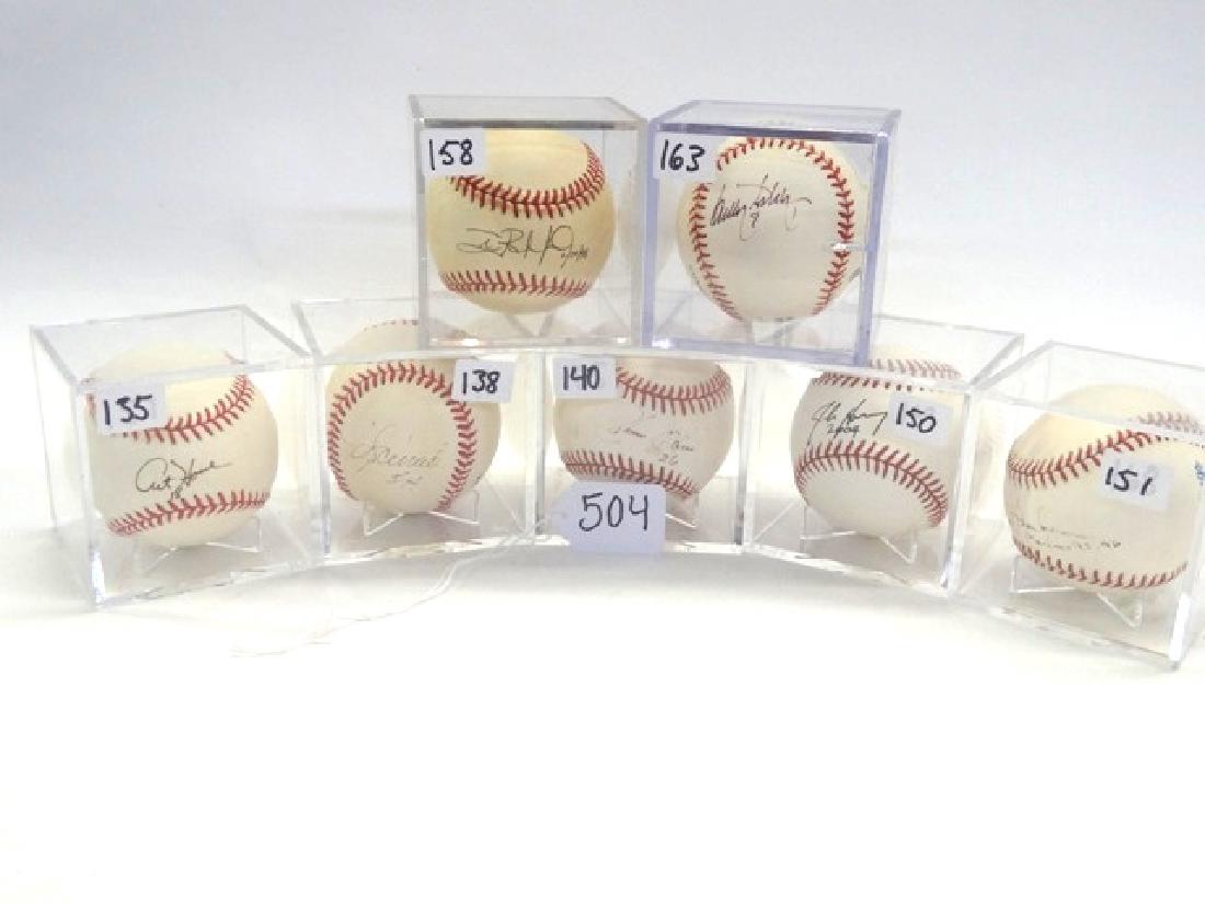 Seven Autographed baseballs: Art Howe, Mike Scioscia, Johnny Oates, John Henry, Rene Lacheman, Desi Relaford, Billy Ashley