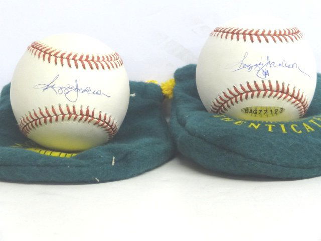 Two Reggie Jackson signed balls with coa (1 of 1)