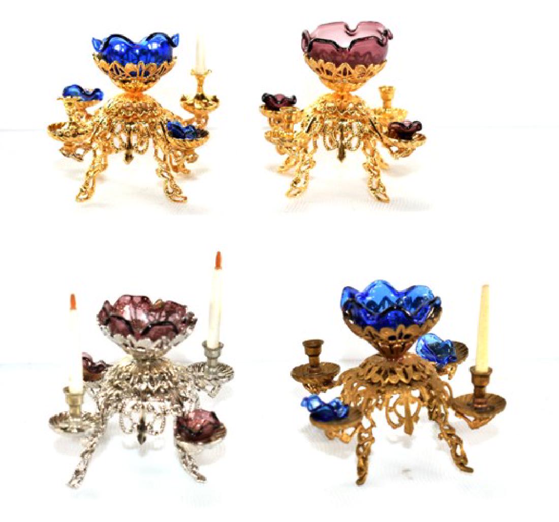 Four Ellen Blauer Dollhouse Epergnes Miniatures: Four Ellen Blauer dollhouse miniature epergnes with glass bowls and dishes 1.5"W, one brass epergne with blue glass, one silver epergne with pink glass, electroplated gold epergne with pink glass and