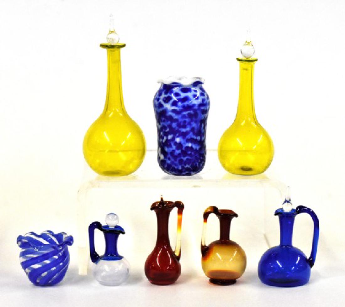 Edward Hill Hand Blown Dollhouse Colored Glassware: Edward Hill, Glassblowers of Greenwich, pair of yellow decanters with clear stoppers 2"H, milk glass vase with blue decoration 1.25"H, four wine jugs, blue and clear vase with rubbled rim,