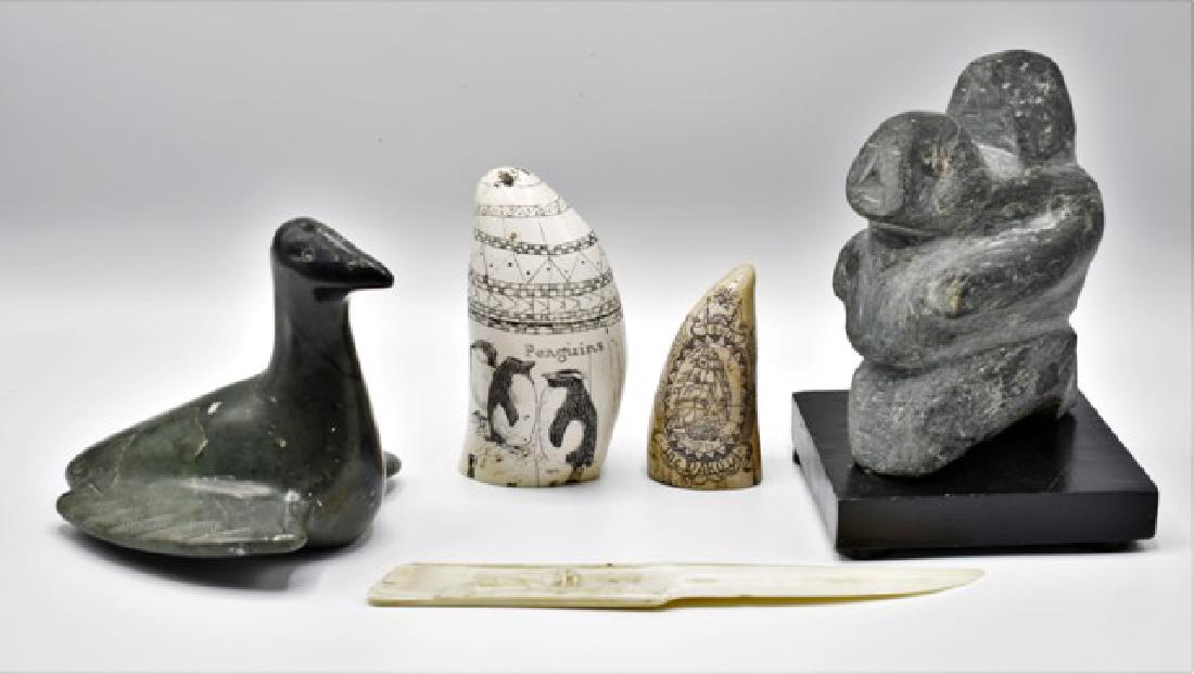 Inuit Stone Carvings & Others: Carved stone goose with illegible scratch signature and label "Canada Eskimo Art" 5"L, carved stone pair of figures on a sled mounted on a wood base 6.5"H, bone letter opener with a intaglio carved wa