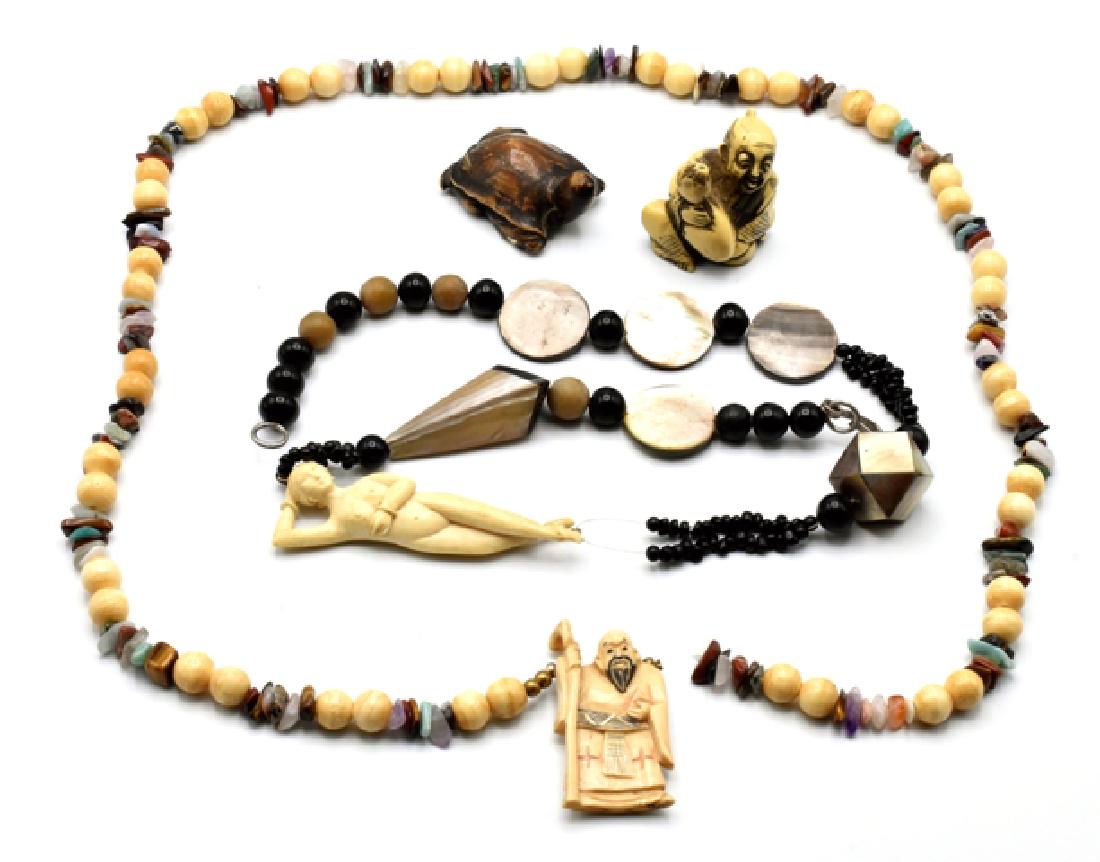 Vintage Carved Bone Netsukes & Jewelry: Necklace set with carved bone nude, shells and beads 24"L, necklace set with carved bone netsuke, bone and stone beads 33"L, bone netsuke of a seated man holding a gourd 1.5"H, stained bone netsuke of
