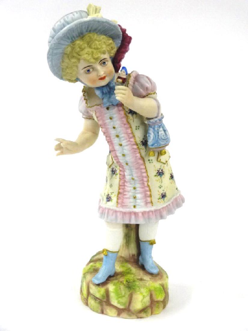 Large Bisque Statue of Girl With Jack In The Box: Very high quality hand painted statue of a young girl holding a Jack In The Box 13"H
