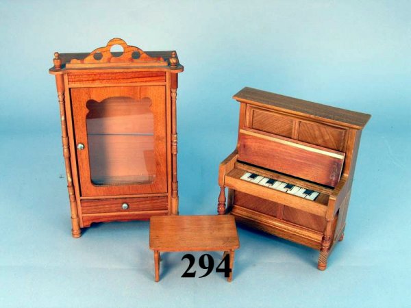 Large Scale Schneegass Furniture: 6 PCS including a Piano, wardrobe, cupboard, enclosed wall clock, arm chair and small table or bench. All of the pieces are "golden oak". The piano is in a larger scale standing 6 3/8 inches high and