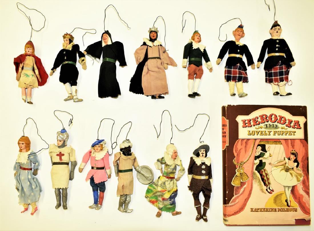 Vintage Dollhouse Size Composition Character Puppets: Group of thirteen vintage composition jointed puppet dolls in costume including Laurel & Hardy and Little Red Riding Hood, average size 5.5" to 6", includes 1942 puppet book