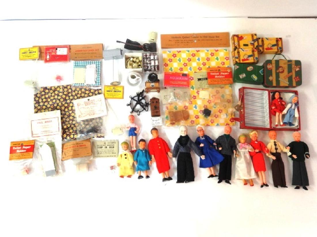 Vintage Shackman Dollhouse Dolls & Accessories: Vintage Shackman 12 dollhouse dolls and boy in trunk 4"W, two rugs in hang packs, 15 hang packs and boxes of small accessories, loose accessories, also two vintage tin and three cardboard suitcases by