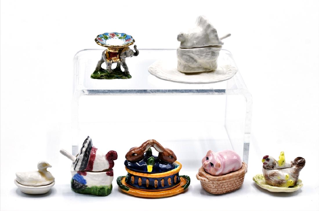 Janice Crawley Dollhouse China Tureens & Compote: Janice Crawley figural tureens, rabbits on basket 1.25"L, polychrome turkey with ladle, white turkey with ladle on tray 1.75"L, pig on basket, chick on hen, small duck, elephant compote .75"H