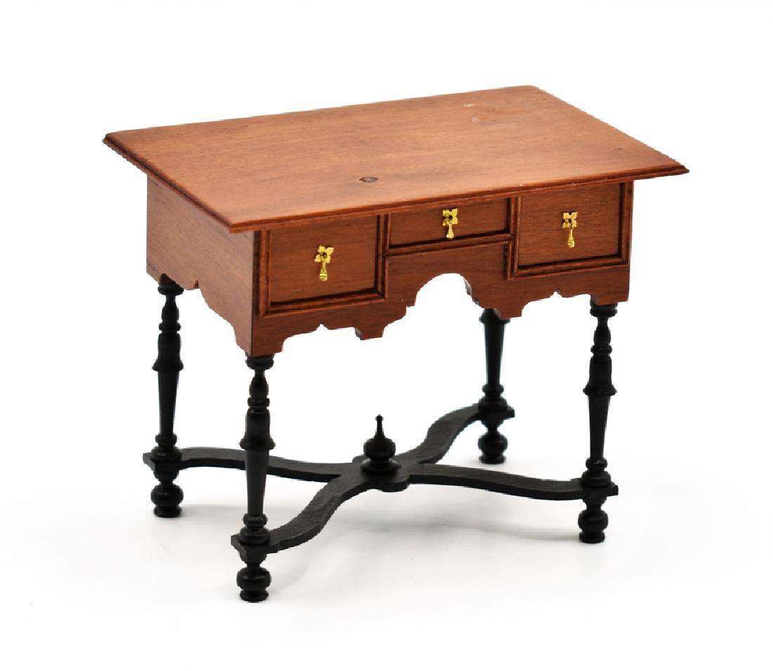 Artisan William & Mary Dollhouse Dressing Table: One of a kind mahogany William & Mary style dressing table made for the 1987 Guild Auction, thumb molded top edge, three drawers, scalloped skirt, painted turned legs with stretchers and finial, 3"W, 