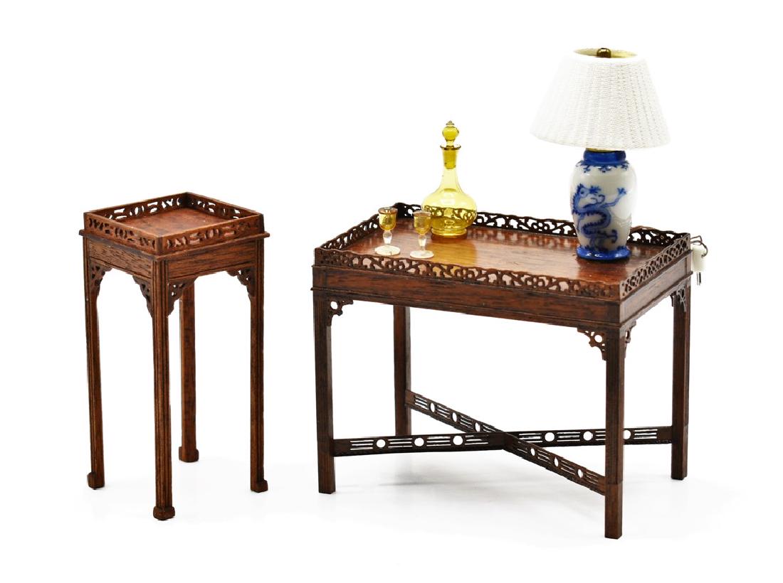Gerald Crawford Dollhouse Tea Table & Other Miniatures: Gerald Crawford mahogany Chinese Chippendale style tea table with scalloped pierced gallery, straight reeded legs and pierced stretchers 2 7/8"L, 2.25"H, 1.75"D holding a Ginger Wyatt electrified blue