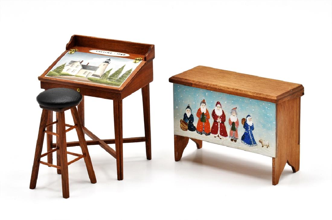 Therese Bahl Painted Desk & Blanket Chest Miniatures: Therese Bahl painted mahogany slant lid work desk with hand painted lighthouse scene 3.25"H, 3"W, 1 7/8"D, Rae Backus mahogany stool with padded seat 2.5"H, unsigned country blanket chest with five ha