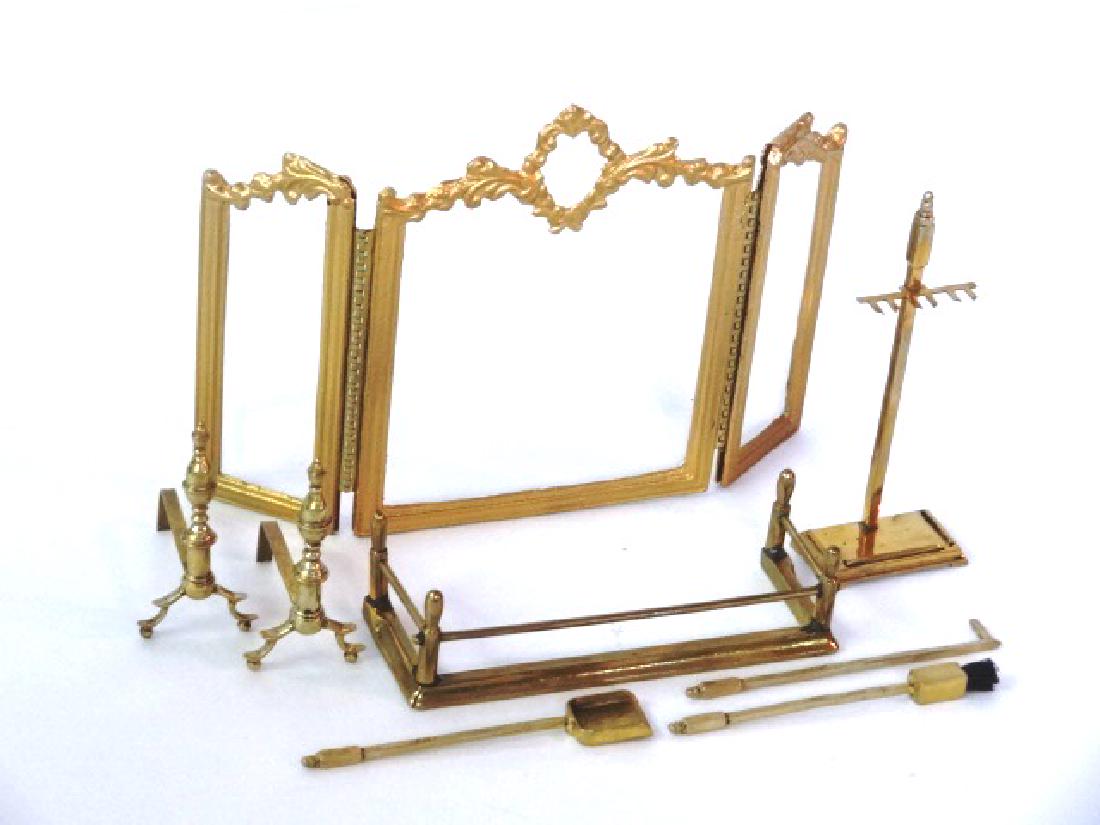 Stetkewicz Dollhouse Fireplace Tools & Other Miniatures: Ron Stetkewicz set of three fireplace tools on stand 2.75"H, unsigned fender 3"W, pair of Chippendale style andirons 2.75"H, cast metal and glass three piece hinged fireplace screen 4.75"W, 3.25"H