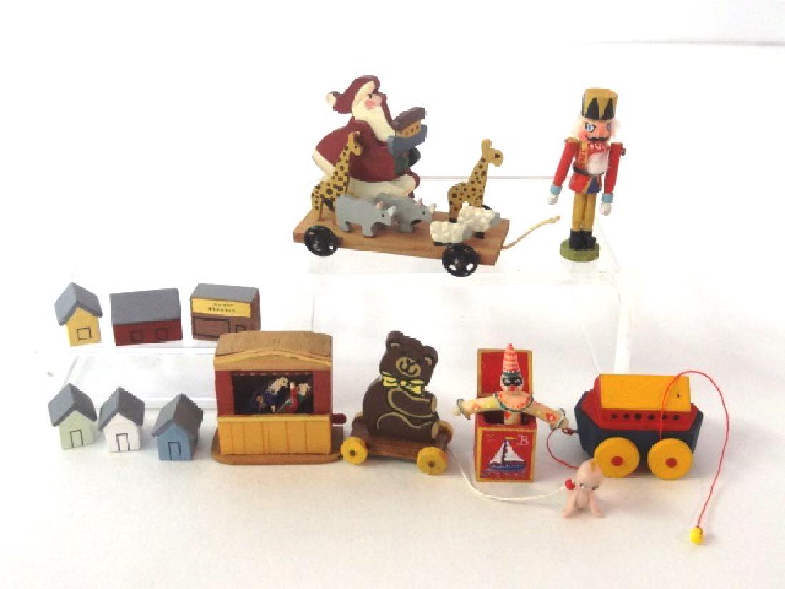 Dollhouse Artisan Toys Miniatures: B. Gleeson bear pull toy 1"H, TCE ark on wheels, Nancy Barnett Punch & Judy Show 1"W, J. Rohall Jack-In-The-Box, C. Donal nutcracker 1.25"H, unsigned Santa with ark and animals pull toy 1 5/8"L, six s