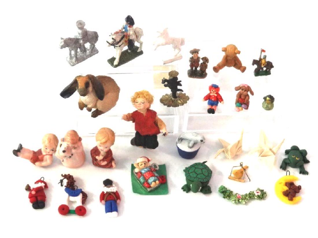 Small Dollhouse Figures and Toys Miniatures: Leslie Frick rabbit 1"H, Mary Neaves bear in sardine can bed .5", tiny rabbit and Raggedy Ann, Zandar painted metal country boy with dog figure 11/16"H, three vintage bisque child figures, group of sm