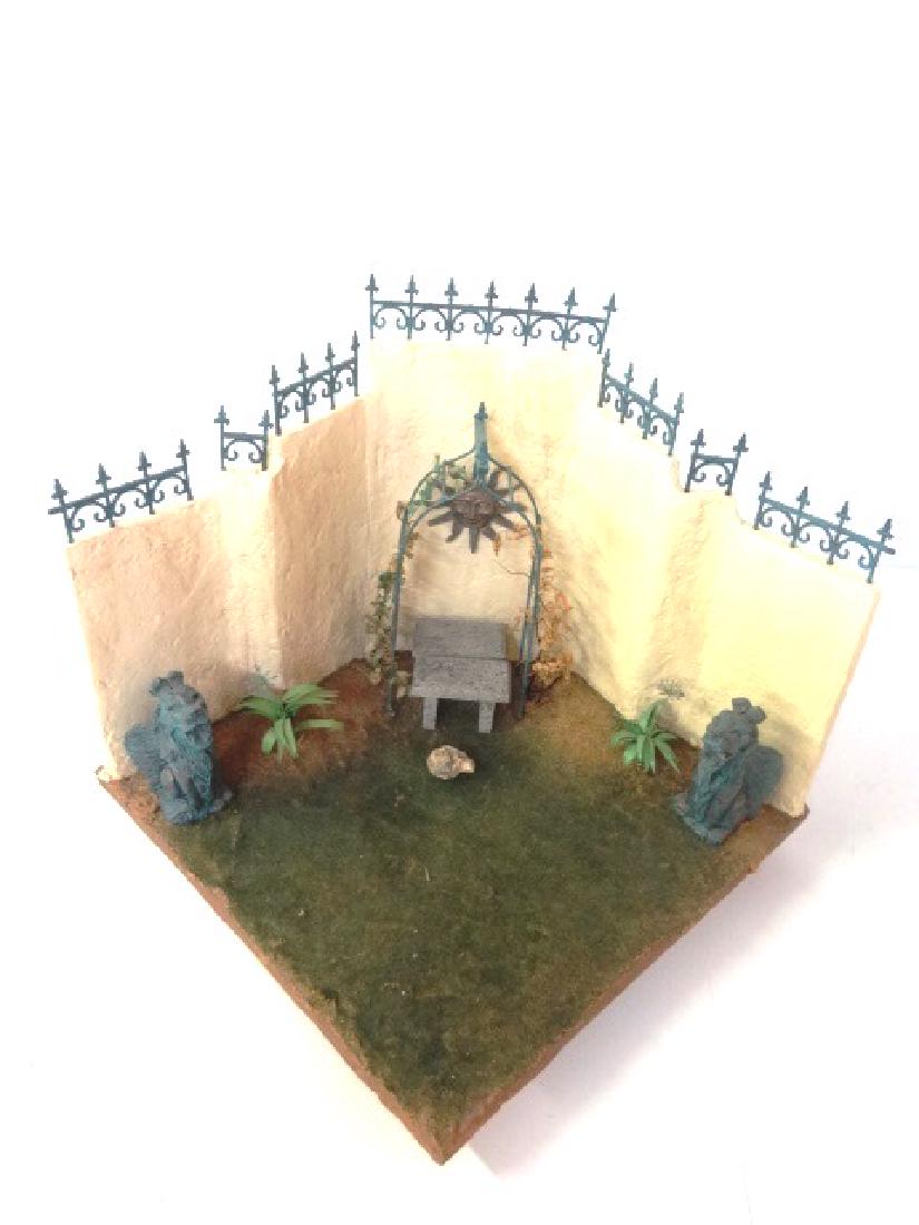 Tom Goad Dollhouse Garden Diorama: Tom Goad artisan garden diorama, stucco style walls topped with grill work, pair of gargoyles and benches, 10" by 10" by 9.75"H