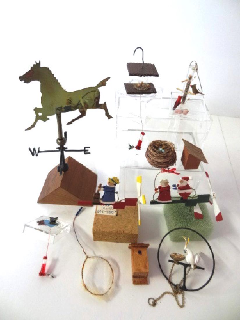 Dollhouse Birdhouses, Weathervane & Whirligigs: Two wood birdhouses, two birdfeeders with hummingbirds, birdfeeder with cardinals, parrot on perch, nest with eggs 1"W, wood and glass feeder by Clara Siusta, animated butter churn painted wood whirli