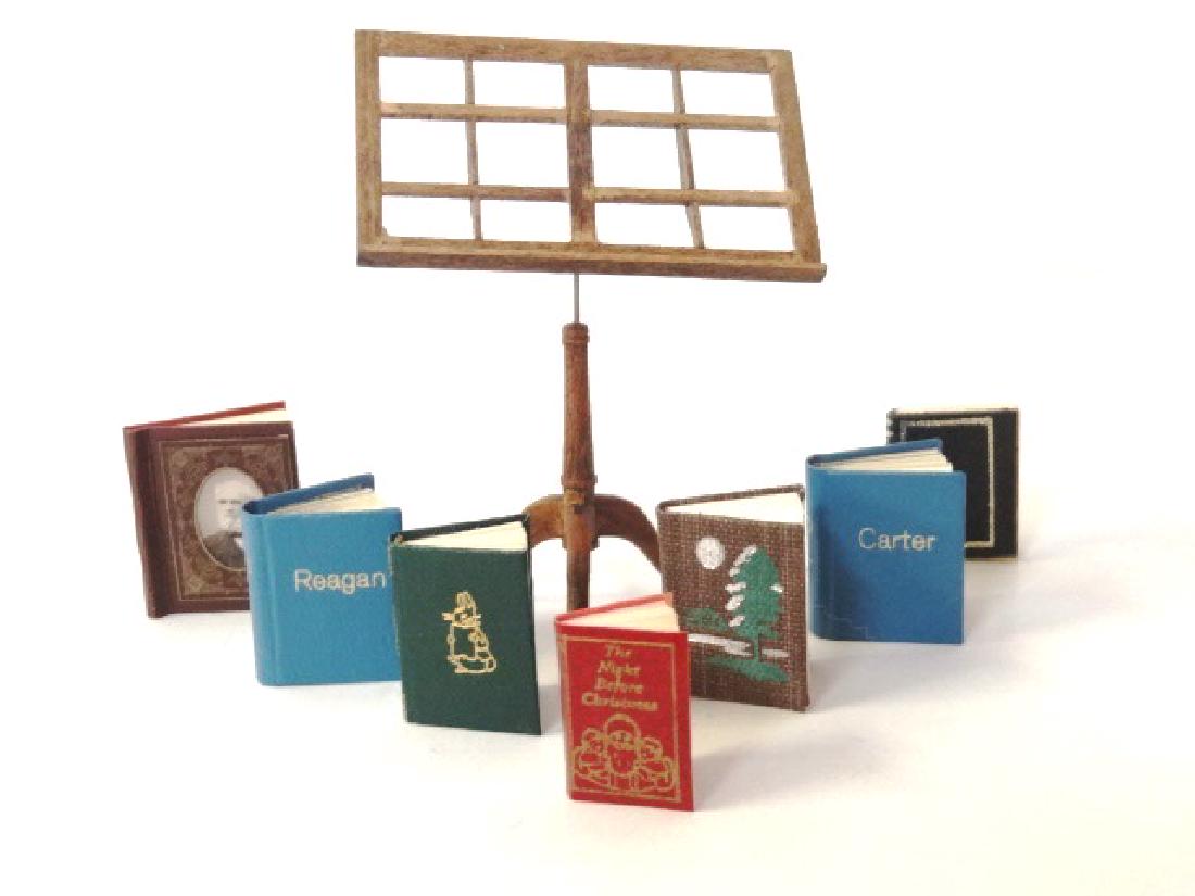 Six Dollhouse Artisan Printed Books & Book Stand: Miniature Book Studio's The Night Before Christmas by Clement Moore .75"H, Barbara Raheb's The Tale Of Peter Rabbit by Beatrix Potter, Carol Wenk's Prayer Book, Three Mosaic Press Books include Trees 