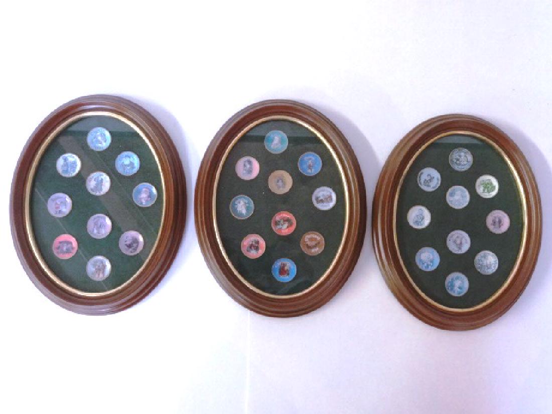 Set of Ellen Krucker Dollhouse Christmas Plates: Set of Ellen Krucker 1" dollhouse Christmas plates complete from 1971 to 2000 nicely mounted in three oval picture frames ready for display, each frame 7.25" by 9.25"