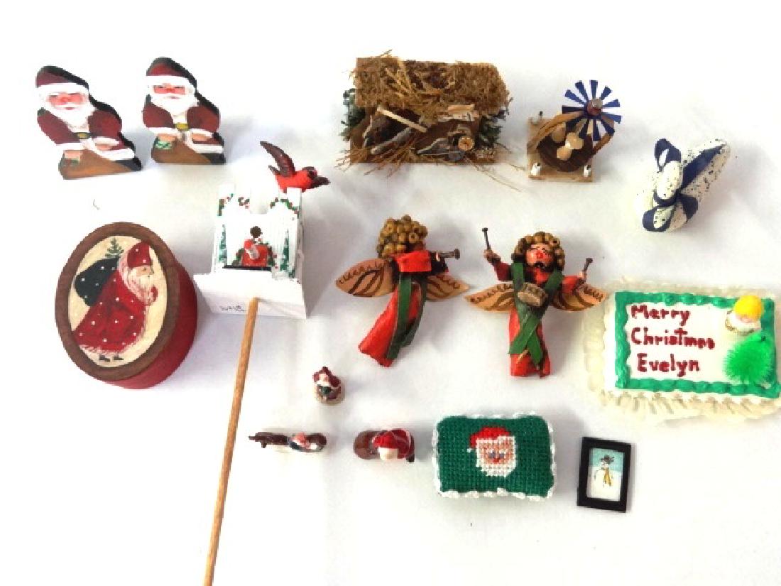 Dollhouse Artisan Christmas Decorations Miniatures: Karen Markland nativity scene 1.75"W, C. Hollis pair of angels, pair of Hiroko Santa fire screens 2"H, three small Ron Benson ceramic Santa figures, Mary Grady O'Brien snowman figure 7/16"H, Xmas tree