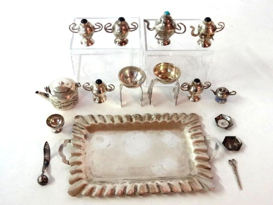 Dollhouse Mexican Silver & Others Miniatures: Mexican sterling tray 4.5"W with two tilting teapots on stands, four lidded sugar bowls, waste bowl and ladle, also unsigned chased teapot 1.5"L, pair of hexagon plates and scissors