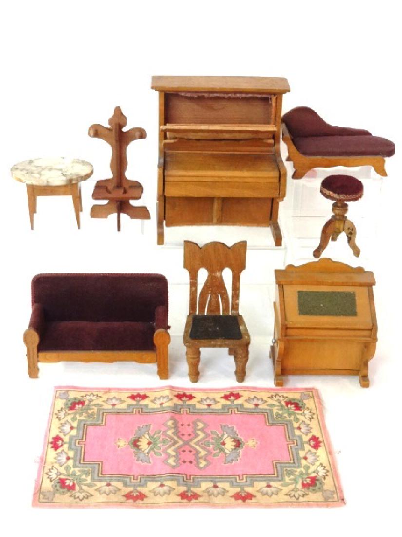 Antique German Dollhouse Parlor Furniture Miniatures: Antique German dollhouse furniture, piano 4.5"W with stool, Davenport desk missing a drawer with chair, sofa with pressed decoration 4.5"W, couch, marble top table 2.75"W, hall tree and a tobacco rug