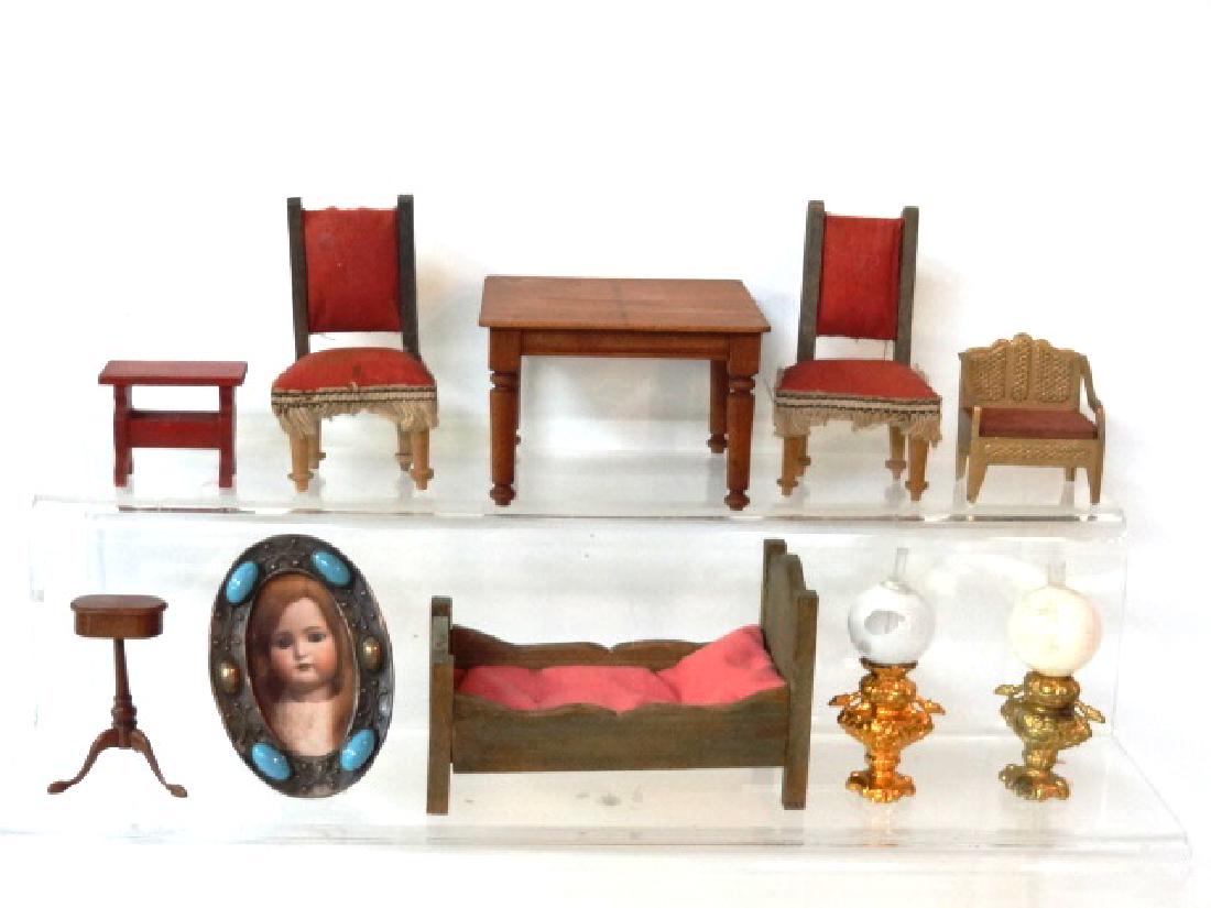 Antique Dollhouse Furniture & Accessories Miniatures: Pair of antique German dollhouse side chairs 3.75"H, antique oval ormolu easel back mirror set with cabochons 3 1/8"H, cast metal armchair 1 5/8"W, antique German bed 4.5"L, magazine stand possibly by