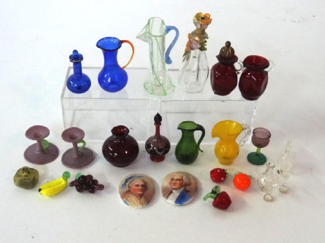 Dollhouse Miniature Glass Accessories: Dollhouse glass pitchers, vases, German candlesticks, pitchers, lamp globe, decanter and glasses, small hand blown fruit, also a pair of George and Martha Washington oval ceramic plaques 1 1/16"H