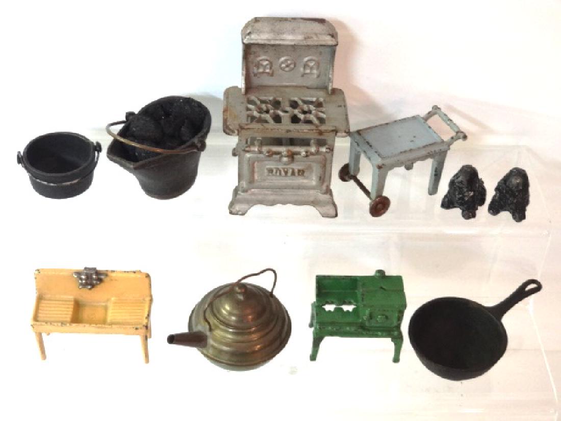 Dollhouse Cast Iron Accessories Miniatures: Dollhouse cast iron Royal stove 4.5"H, pair of spaniels1.75"L, Kilgore 1/2" scale sink 3"L, stove and tea cart, cast iron coal scuttle 3.5"L, pot and pan, also a brass tea kettle 3.5"L
