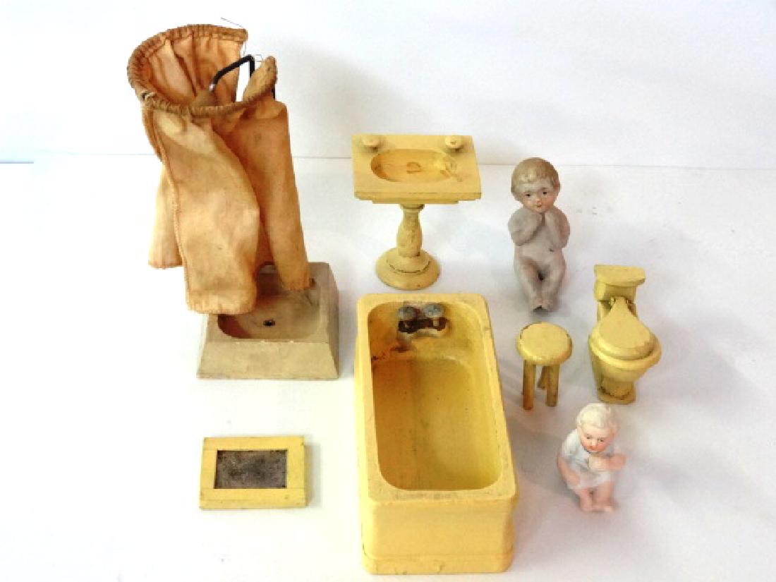 Vintage Schoenhut Dollhouse Bathroom Fixtures: Vintage painted wood Schoenhut bathroom set circa 1930 with original paint includes tub 5.25"L with bathing bisque boy, shower with curtain 5.5"H, sink 2.75"W, toilet, mirror and stool, bisque baby ea