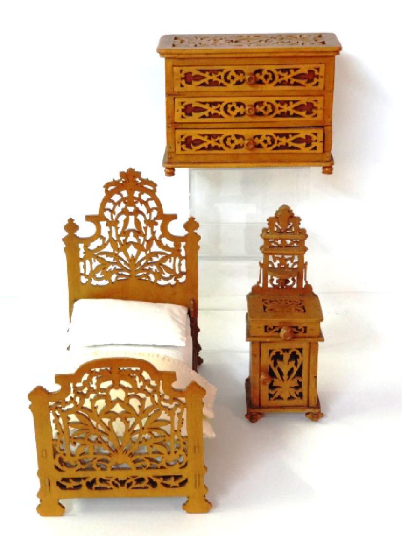 Large Scale Dollhouse Fretwork Bedroom Set Miniatures: Antique Victorian style fretwork bed with padded mattress, pillow and spread 9"L, 5.25"W, 8"H, matching three drawer dresser lined with original paper 6.5"W, 4.75"H, 3"D, matching nightstand 2.75"W, 7