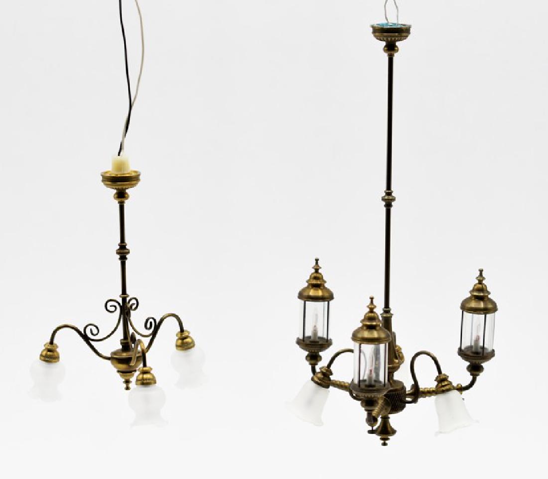 Two Scott's Lighting Dollhouse Chandeliers Miniatures: Scott's Lighting dollhouse antiqued brass six socket chandelier with three brass lantern globes and three frosted shades 5.25"H, 2.75"W, Scott's Lighting three socket brass chandelier with frosted gla
