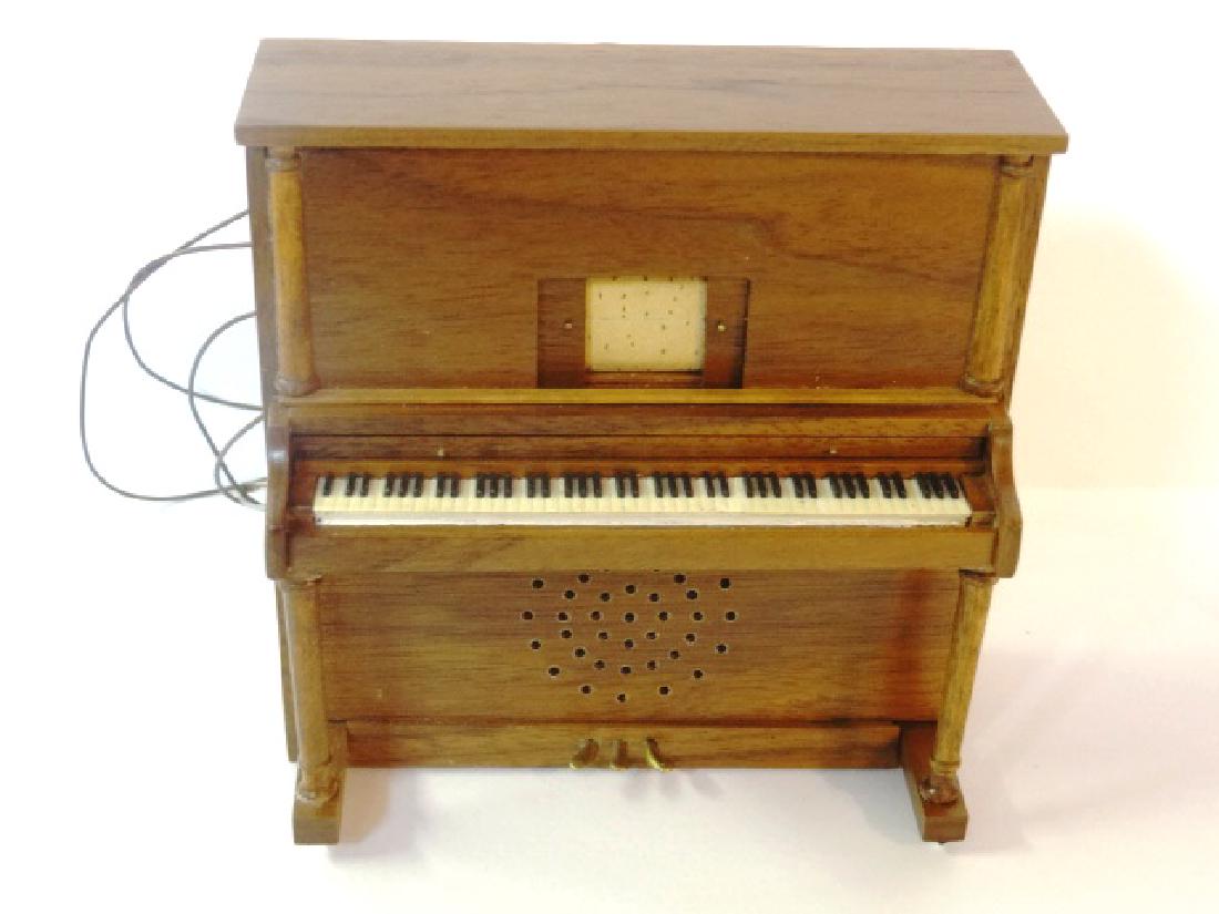 RCMS Player Piano Speaker Dollhouse Miniature: Artisan mahogany upright piano signed RCMS 1994, small speaker in bottom front connects by wiring to a small cassette player with a Frank Sinatra tape 4.5"W, 4.5"H, 2.25"D