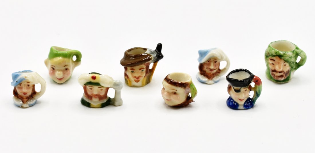 Dollhouse Artisan Toby Mugs Miniatures: Seven dollhouse toby mugs average height 3/8", five are by Betty Neiswender, one is marked DF and one has illegible mark