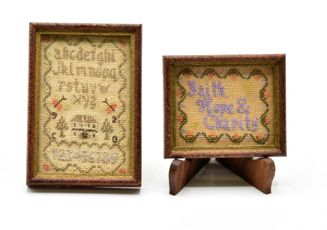 Two Caren Garfen Dollhouse Samplers Miniatures: Two Caren Garfen hand made English dollhouse samplers, alphabet sampler in wood frame 1.25" by 1.75", "Faith, Hope & Charity" sampler in wood frame 1 1/8" by 1.25"