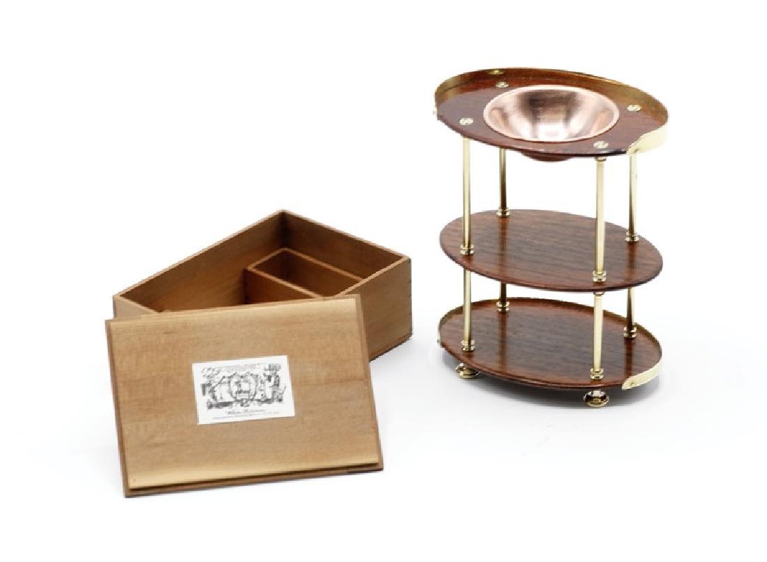 W. Robertson Cased Dollhouse Campaign Dry Sink: William Robertson cased traveling campaign dry sink for the discerning military officer or safari camp, housed in wood crate with maker's label 2.5"L, 1"H, 1.75"D, assembled to make three level mahoga