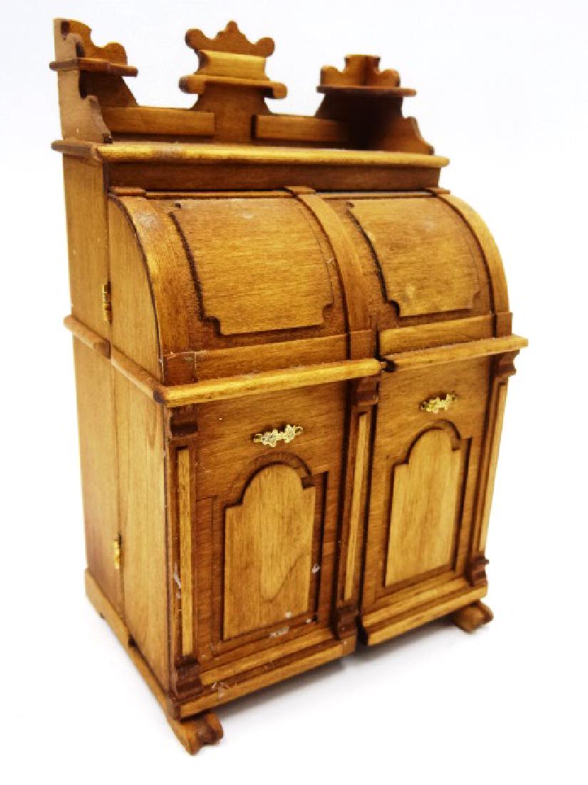 Jim Gans Dollhouse Wooten Desk Miniature: Jim Gans nicely detailed artisan Wooten style desk opens to reveal a drop down desk, small drawers and file slots, 4"W, 6.5"H, 3"D