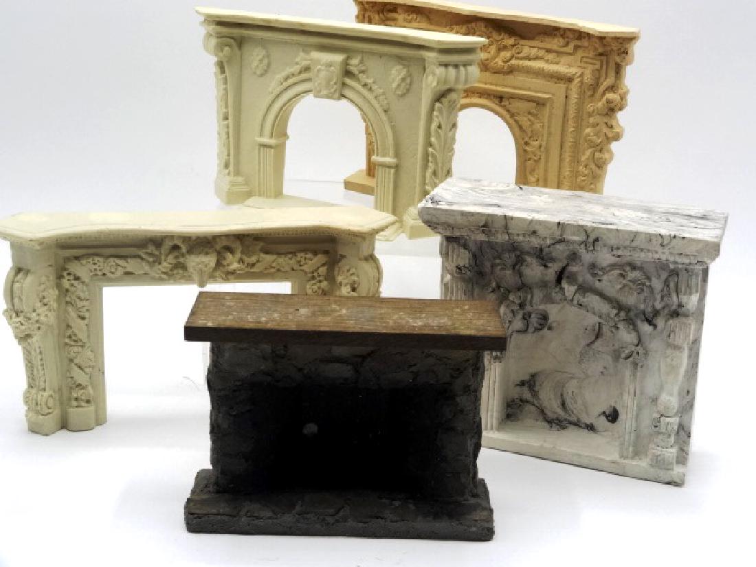 Dollhouse Miniature Fireplace Mantels: Four ornate cast fireplace mantels 5" to 7"W, artisan wood and stone fireplace with lights has illegible signature 5"W