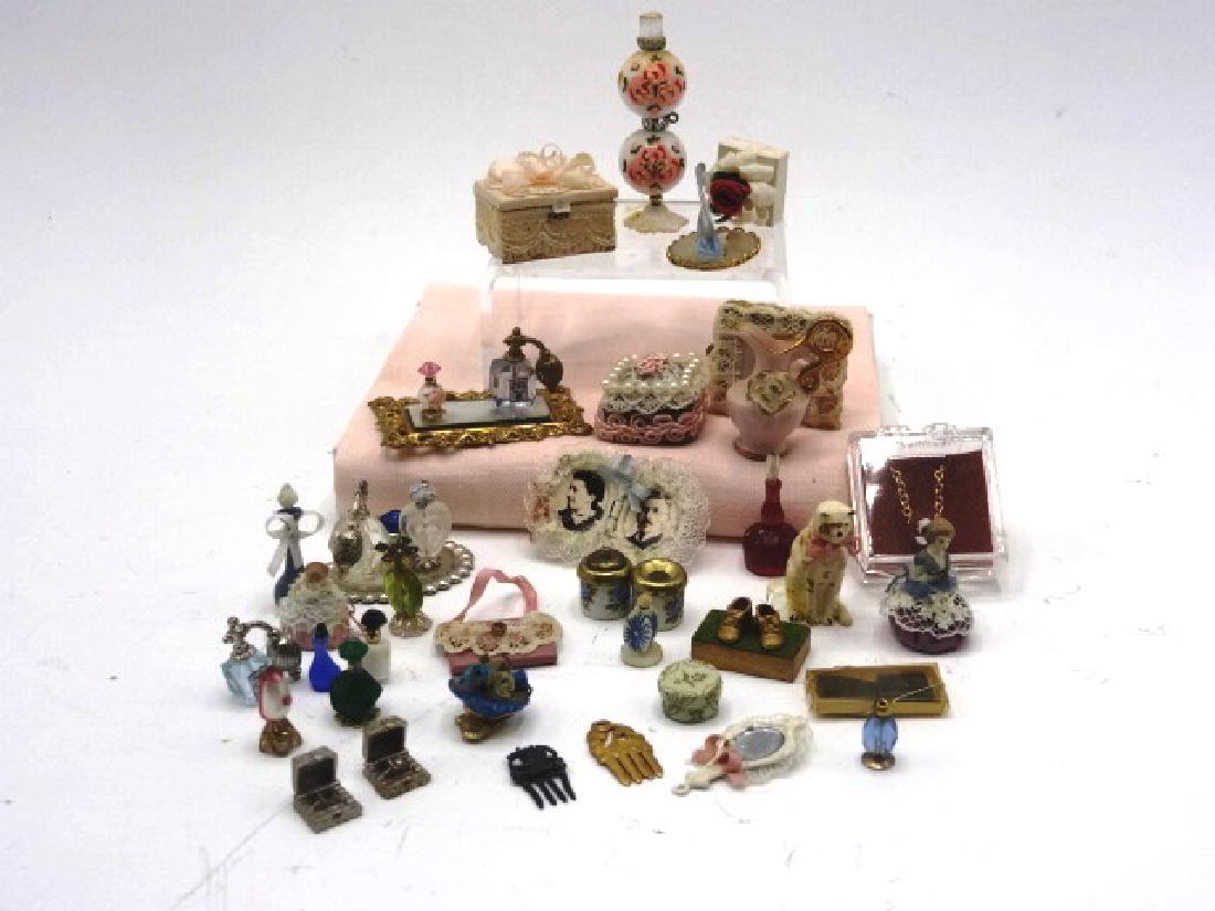 Dollhouse Lady's Accessories Miniatures: Nice selection of small miniatures, ormolu mirrored tray with perfume bottles 1.75"L, jewelry, jewelry boxes, baby shoes, hair combs, picture frames, pitcher, dresser dolls, jars etc.