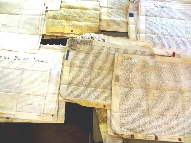 38 Antique English Indentures: Large collection of 38 English indentures and abstracts, 37 hand written on vellum and one on parchment ranging in age from the mid 1700's to the late 1800's, each indenture ranges from one page to tw