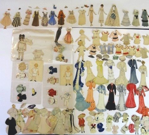 Early 20th Century Handmade Paper Dolls: Group of handmade paper dolls from the late 19th, early 20th centuries, 7.5"H lady with repaired neck has 19 dresses, blouse and 5 hats, 4.75"H girl has 33 dresses and 3 hats, 7"H handmade doll with 7