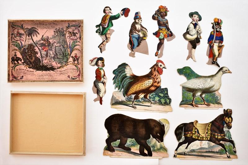 The Boy and his Horse Metamorphoses Paper Dolls: Very unusual mid-19th century boxed set The Boy And His Horse Double Riding Toy in a great variety of Metamorphoses by G.W.F. & W., two piece box printed in English, French and German 8.75" by 10.5", 