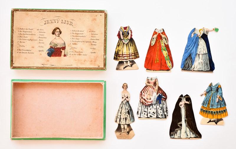 Jenny Lind Paper Doll Set: 19th century boxed paper doll set of famous actress Jenny Lind, two piece hand colored box 4" by 6.75" contains 4" doll with six costumes