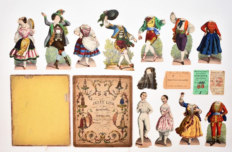 Jenny Lind Paper Doll Set: 19th century boxed Jenny Lind paper doll set, two piece hand colored box printed in English and German 8" by 9.5" missing flaps with hand colored portrait and list of operas on reverse of lid, include