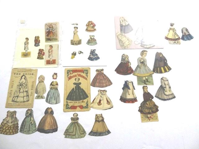 McLoughlin Paper Doll Sets: Minnie Warren has detached folder with losses, 4" f&b doll with neck repair and 5 f&b dresses, extra Minnie Warren f&b 4.5" doll with neck bend has 4 f&b dresses, Carrie Grant has poor 7" doll with re